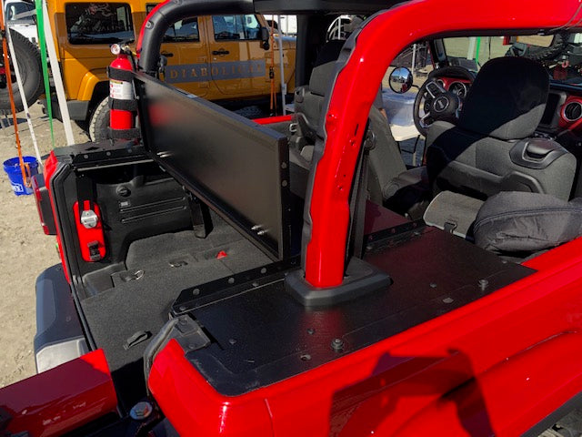 Red Jeep JL 2-door with the Slipstream folding top raised vertical behind the roll bar