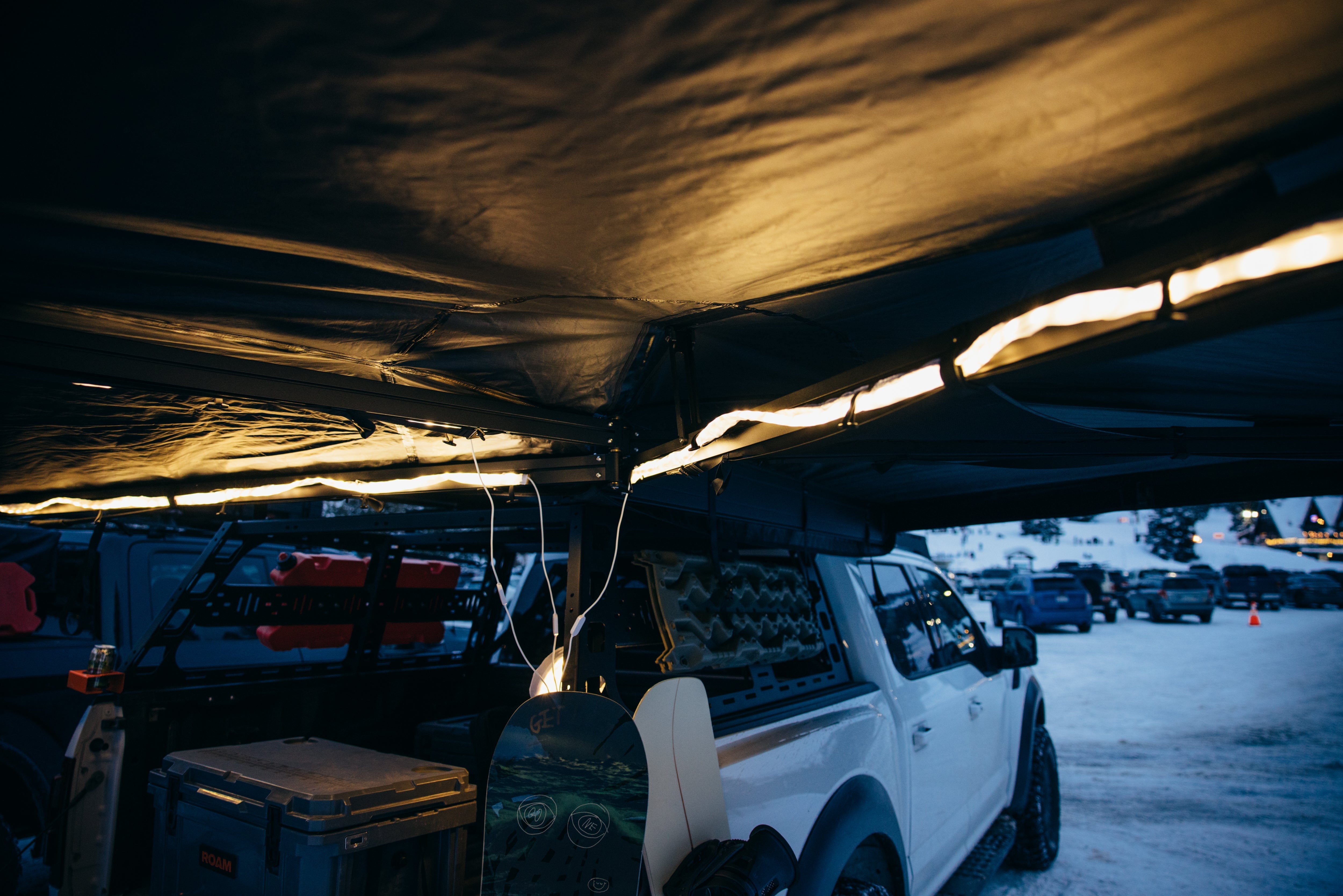 ROAM LED Track Light glowing along an awning arm