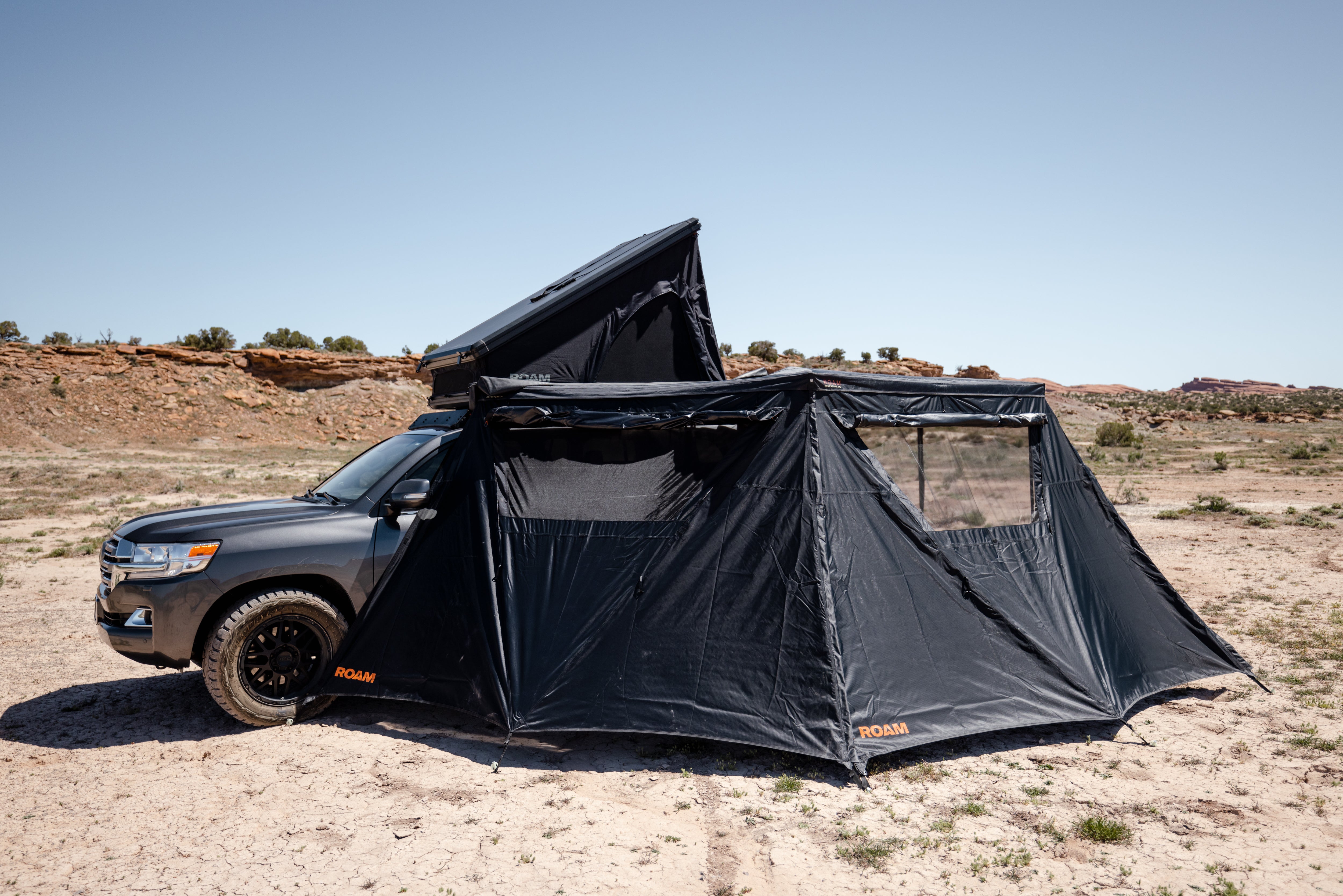 Close-up of ROAM ARC 270 awning wall attachment