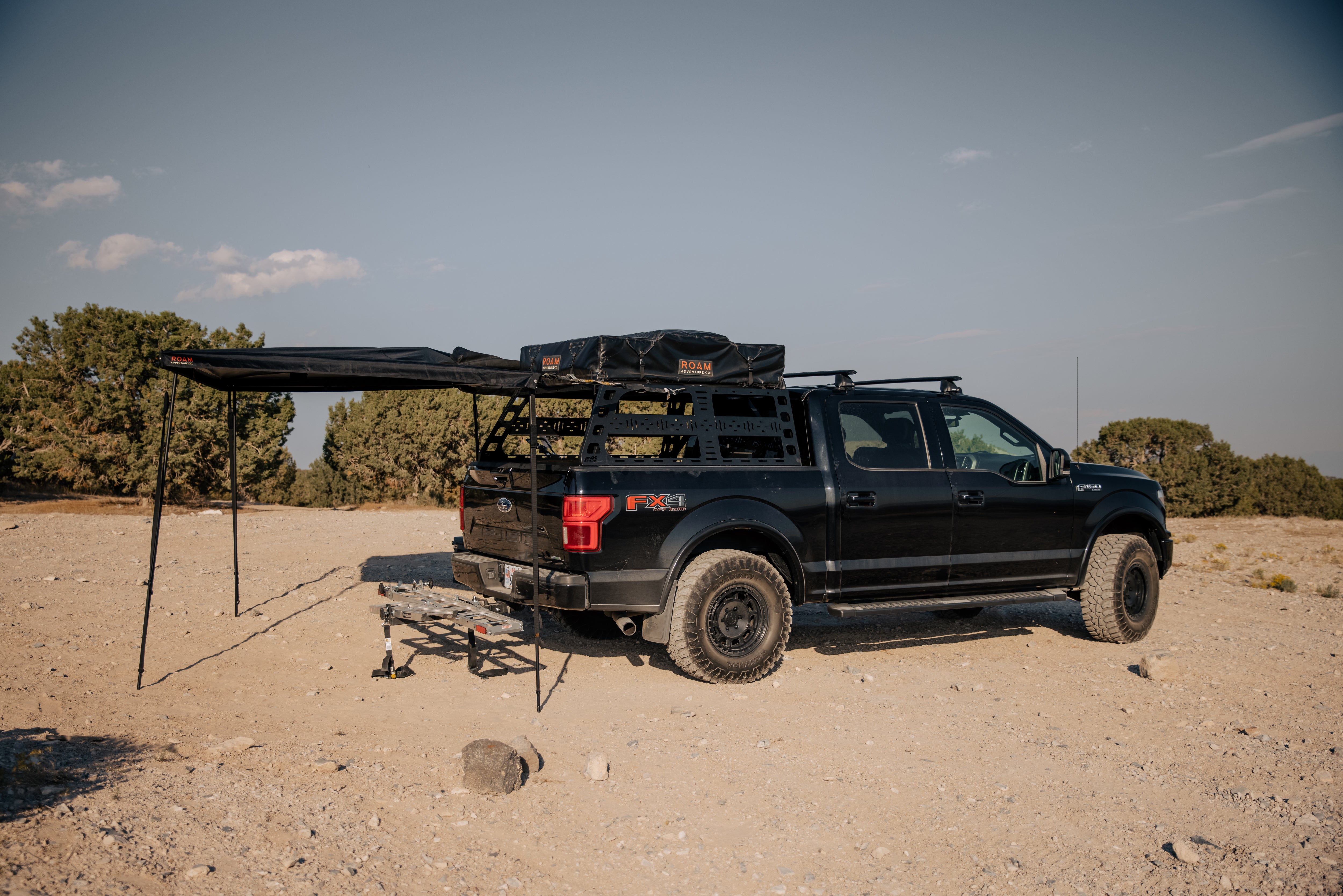 ROAM ARC 270 awning arm extended at camp
