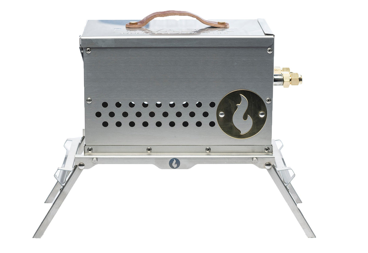 Stainless steel firebox with leather carry handle and brass fitting, studio shot on white background