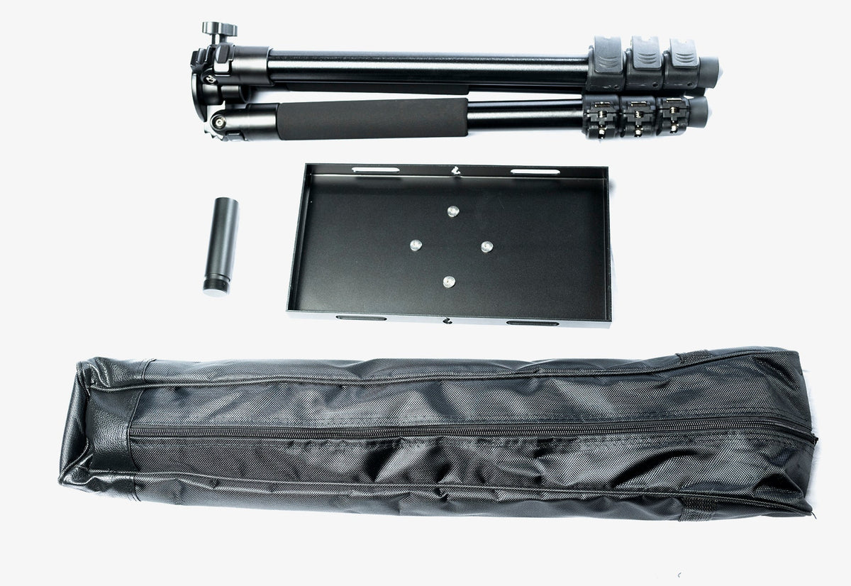 Studio flat-lay of the Daddy Long Legs tripod stand disassembled into its component parts next to its carry case