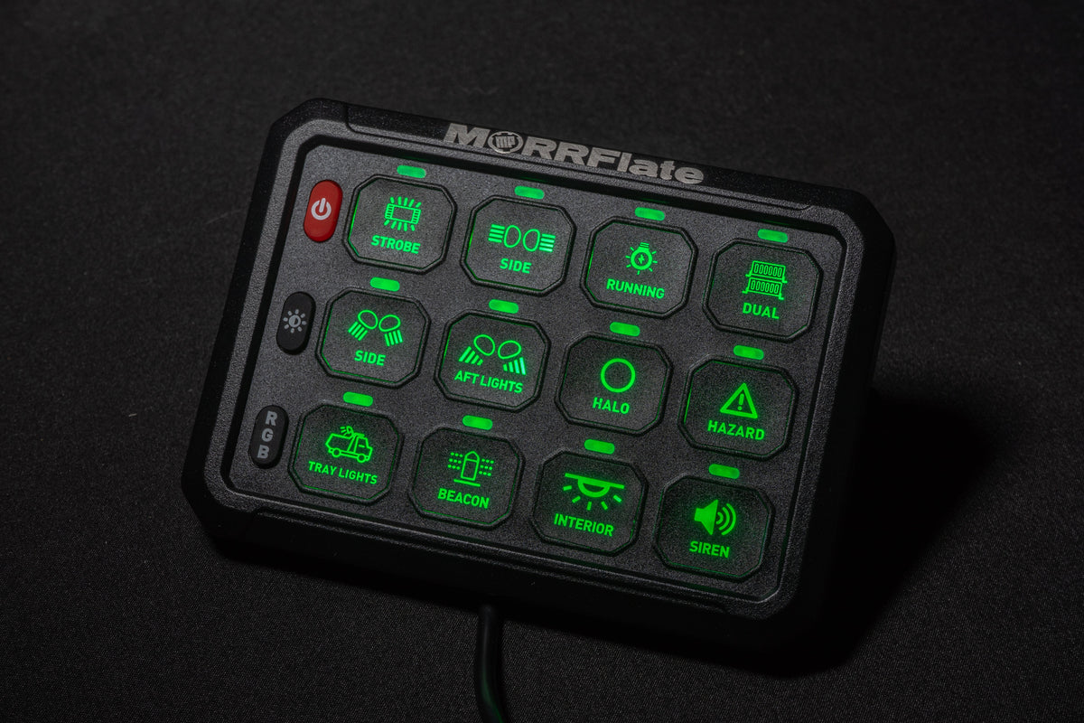 MORRFlate 12-gang switch panel with green backlit buttons labeled strobe, side, running, hazard, beacon, interior, and siren