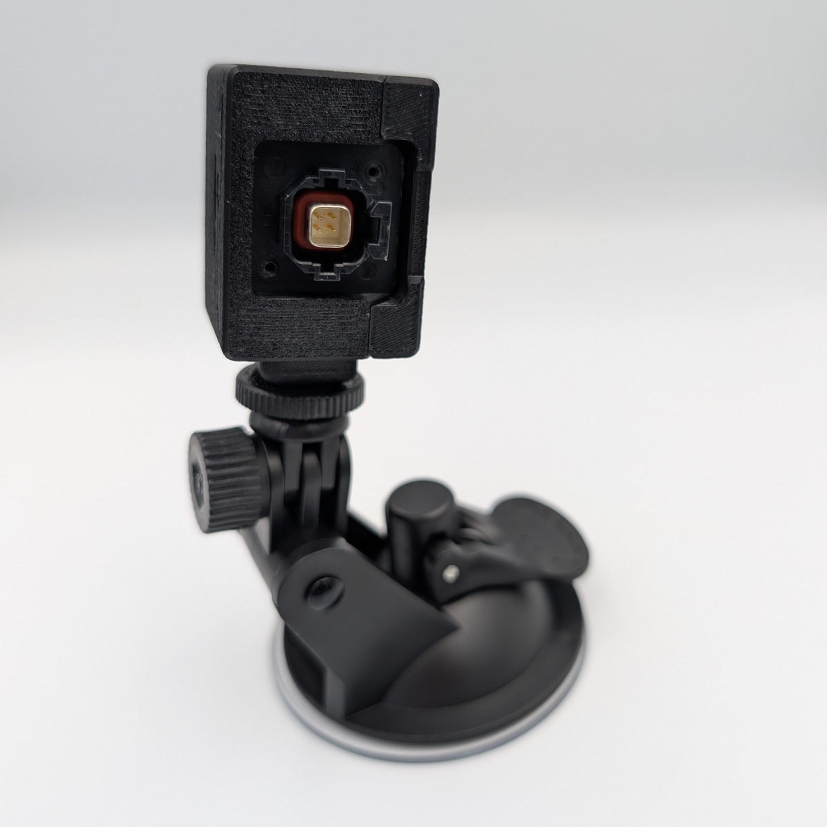 Back of the GG Offroad suction mount housing showing the camera connector