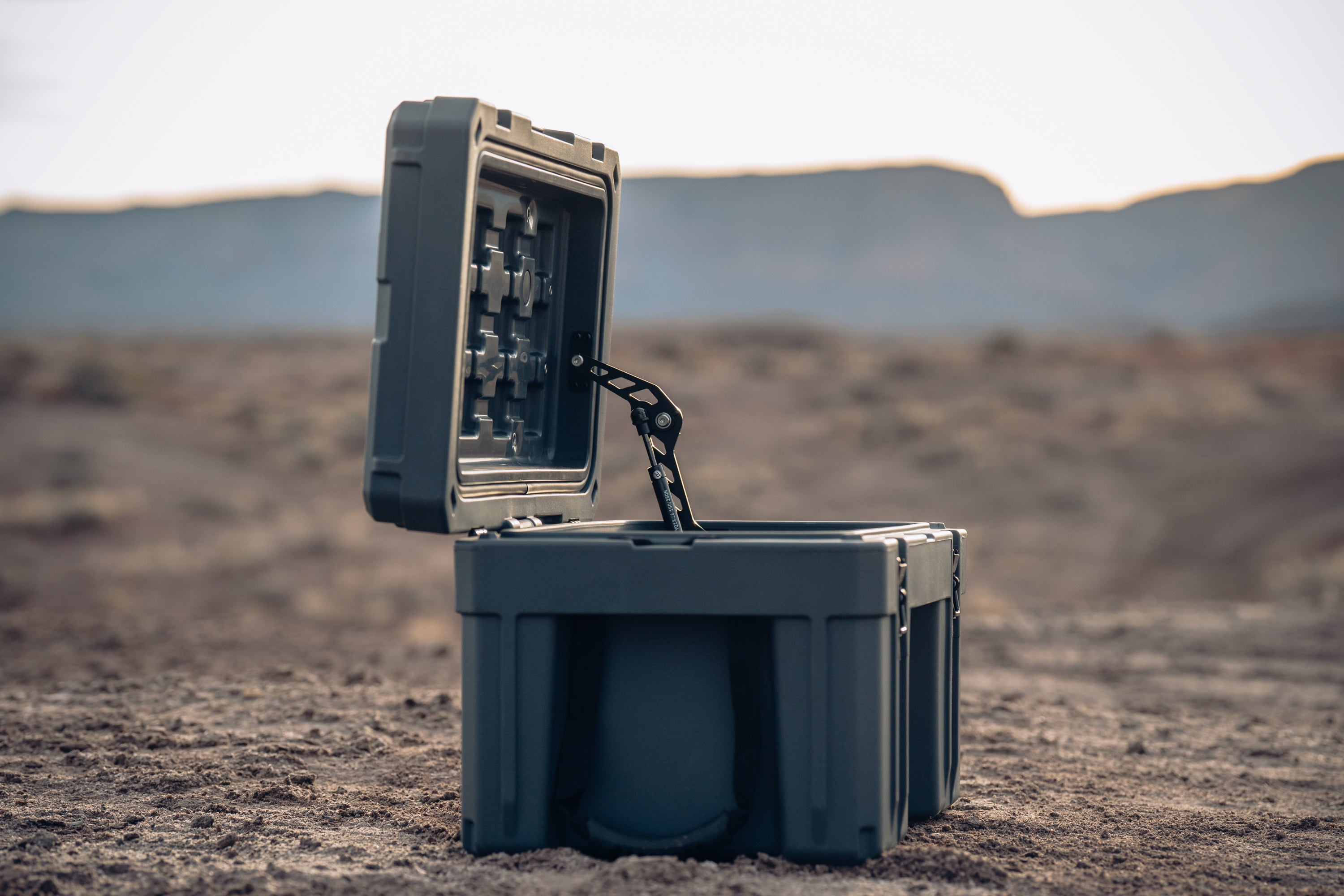 ROAM 76L Rugged Case loaded in the back of a vehicle