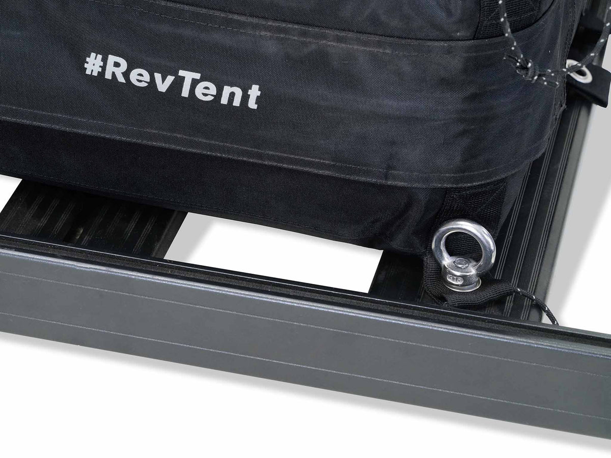 C6 Rev Rack Tent (HellaStorm) – packed tent bag with ring bolt on a rack bar