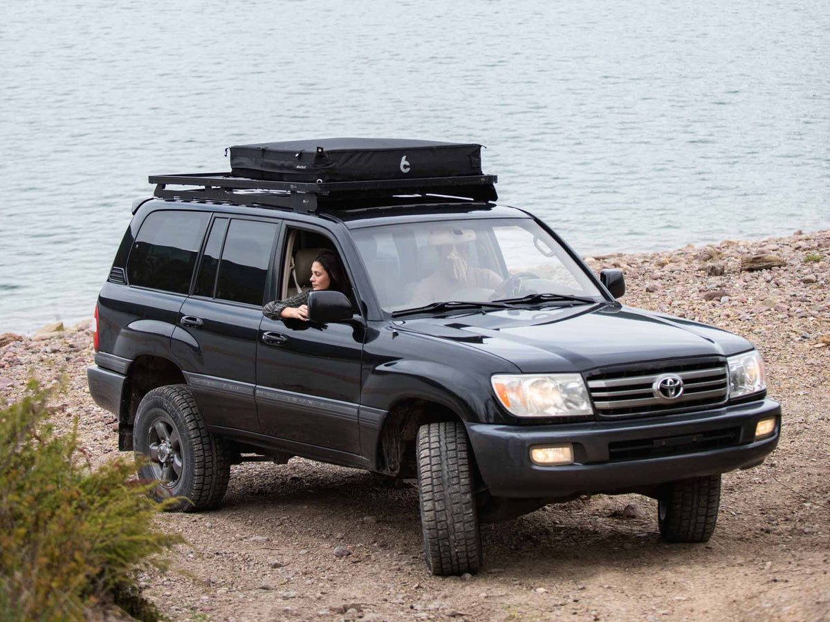 C6 Rev Rack Tent (Eclipse) – vehicle with a roof rack and packed tent bag