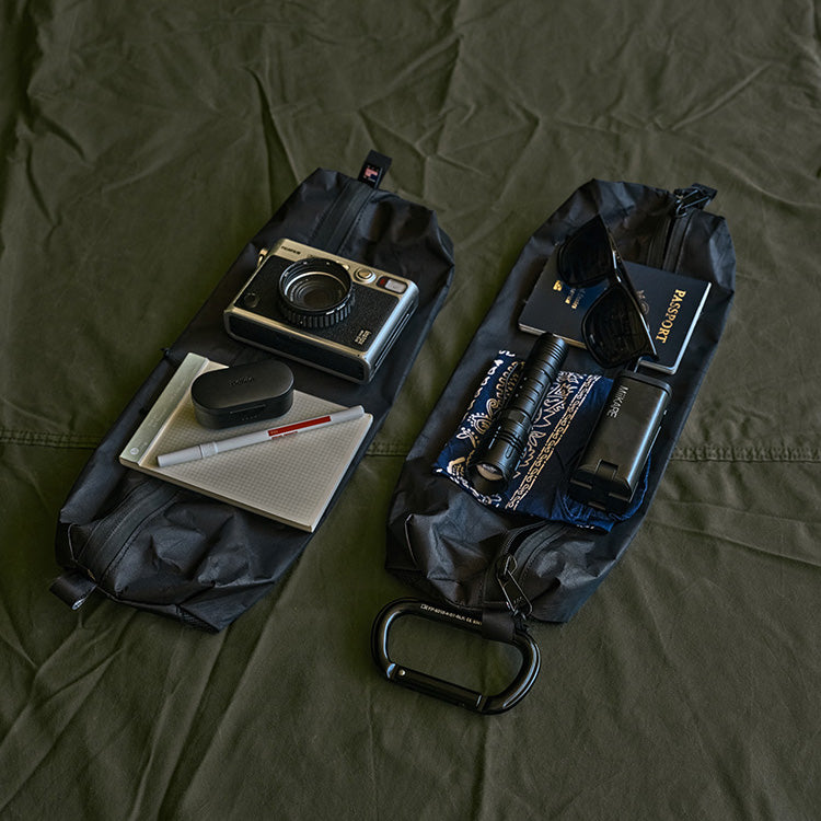 Colfax Equipment Module — UL pouches unpacked, showing camera gear and travel essentials