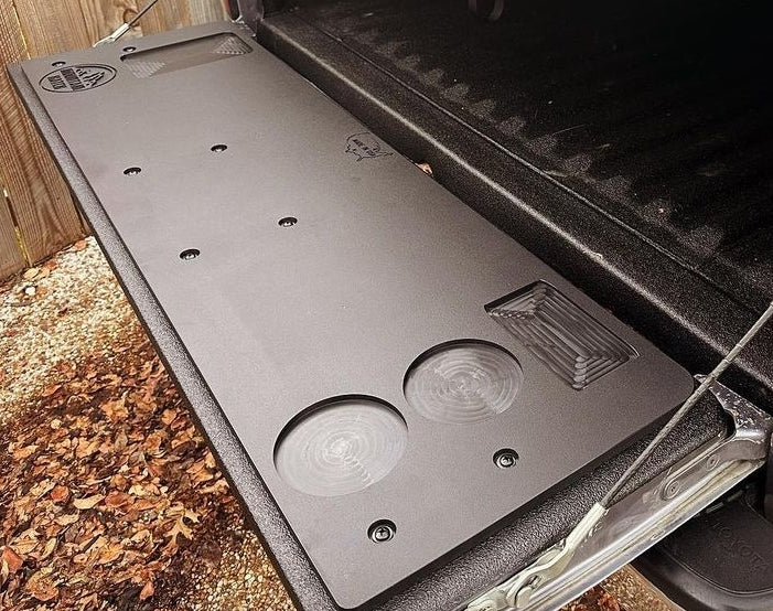 Mountain Hatch recessed-pocket tailgate table on a 1st Gen Toyota Tacoma tailgate with drink holders and utility tray