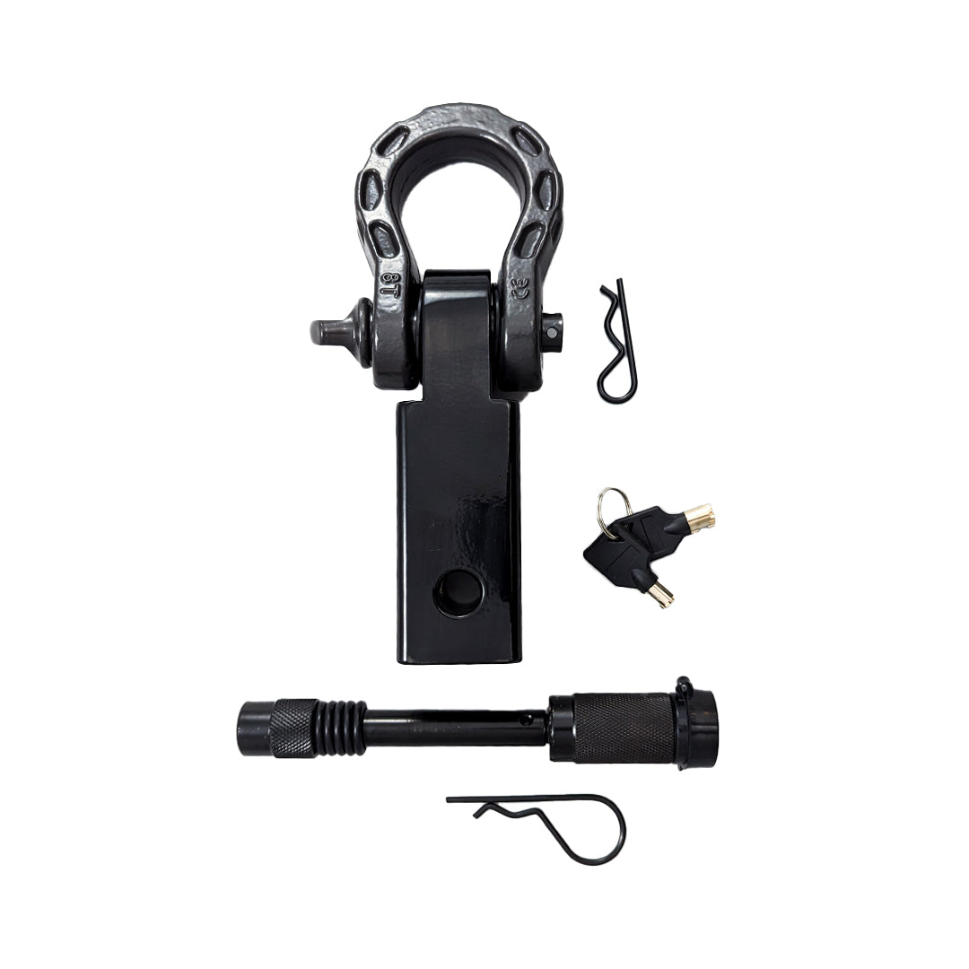 Black shackle hitch receiver with a D-ring, keys, lock pin and clip on a white background