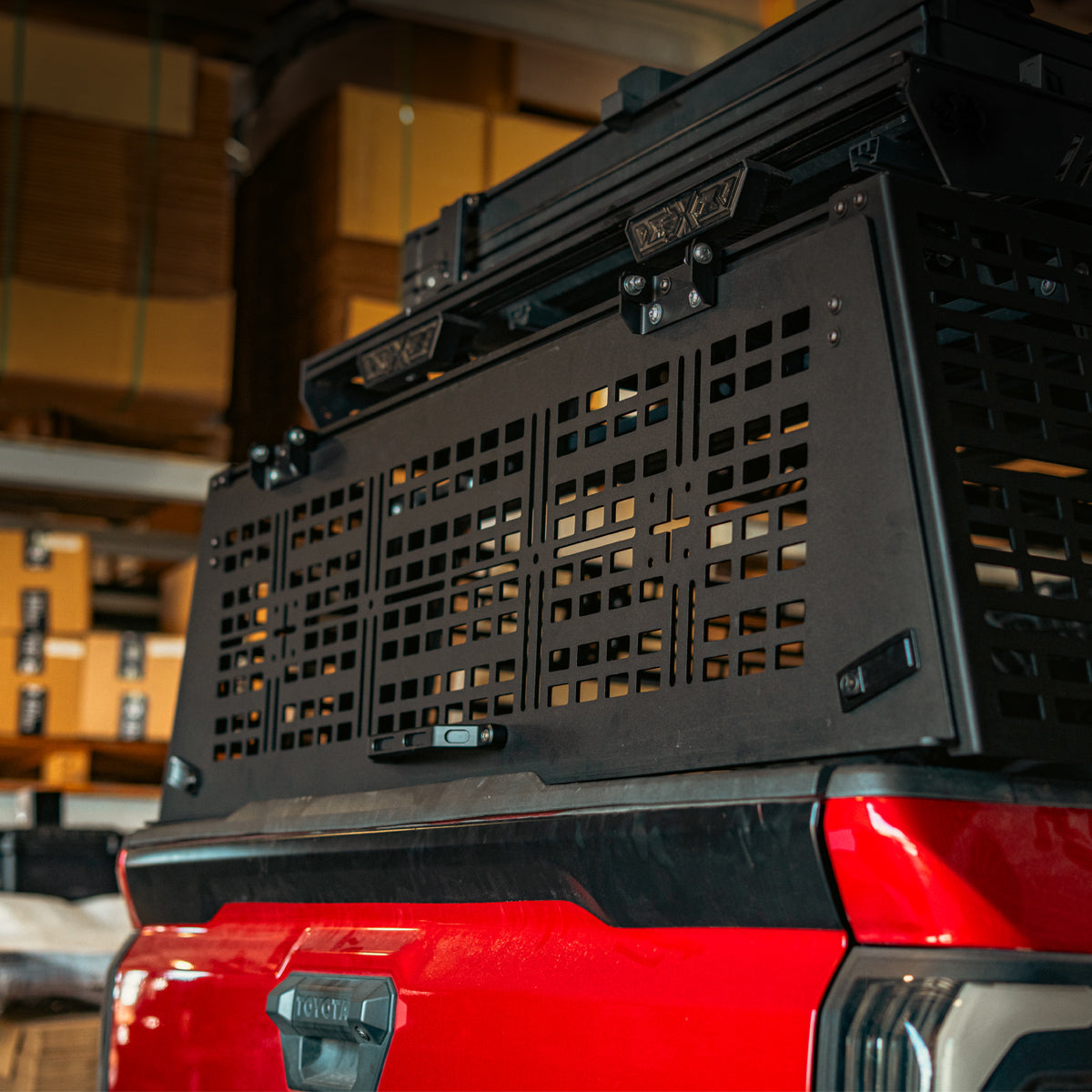 Rear hatch closed on the bed rack, viewed from behind the tailgate