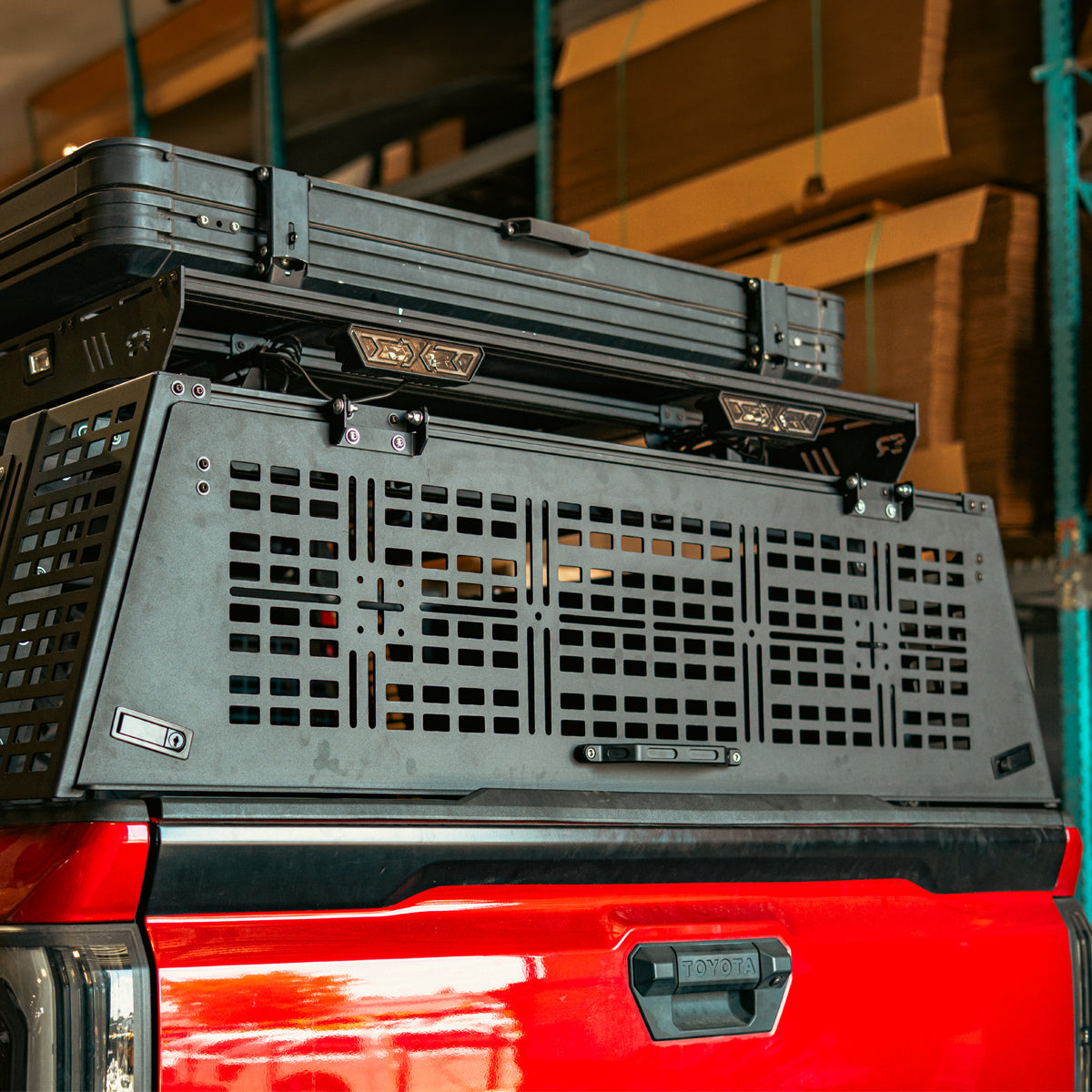 Closed MOLLE rear hatch with a latch visible at the lower corner