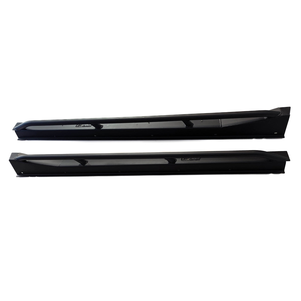Pair of black rock sliders seen from the side on a white background