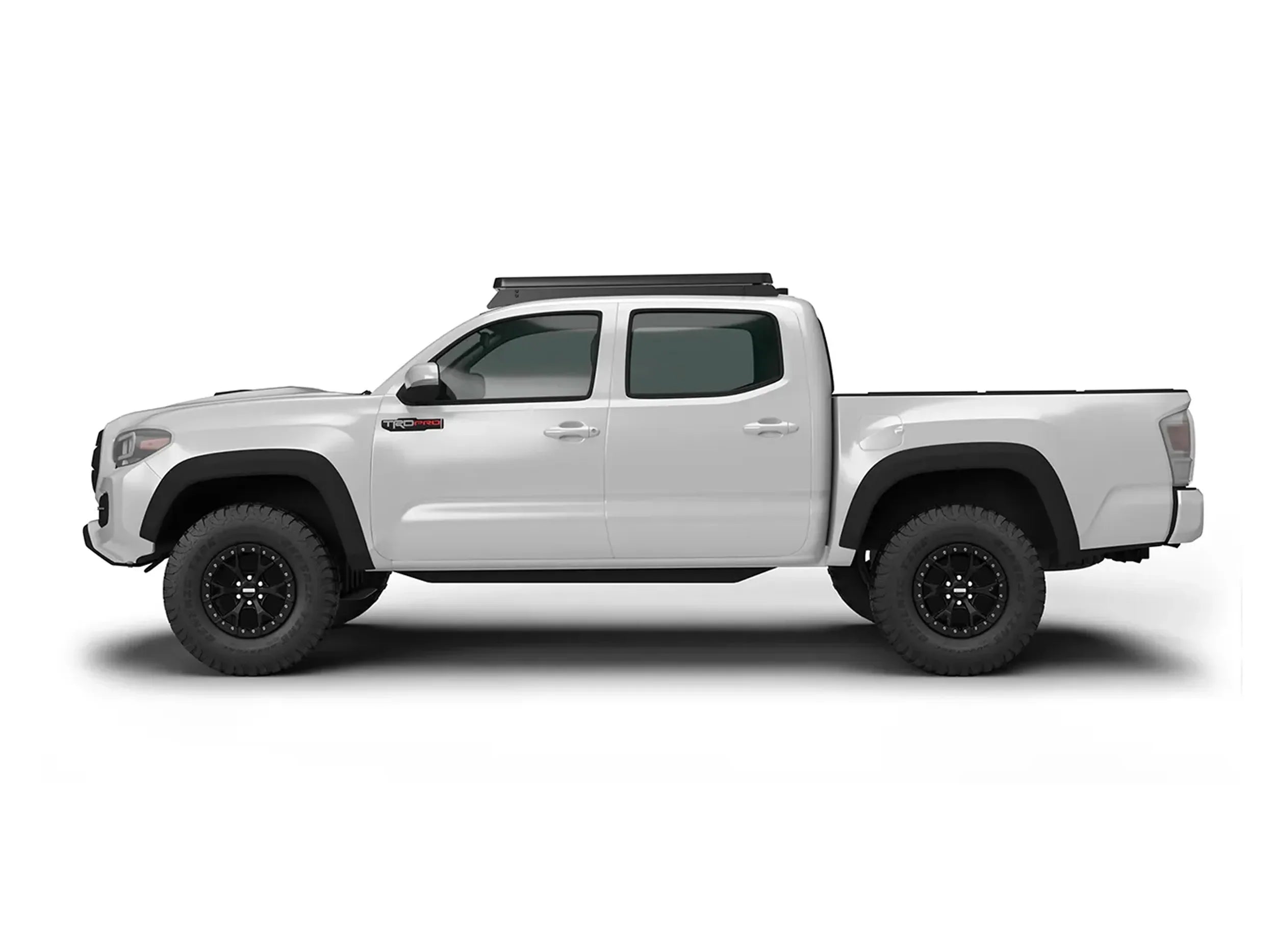 SIDE VIEW OF TOYOTA TACOMA WITH ACS ROOF RACK MOUNTED