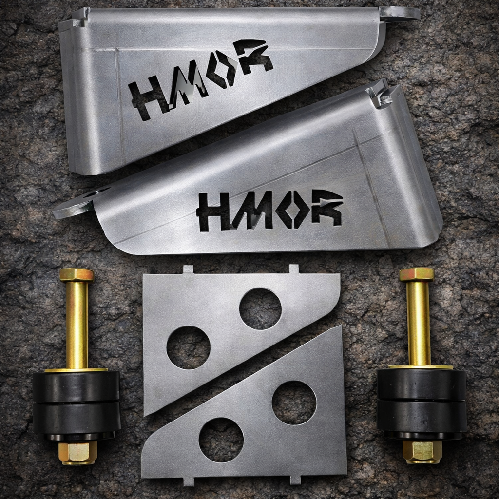 HMOR relocation kit parts: two brackets, gussets, bolts and poly bushings