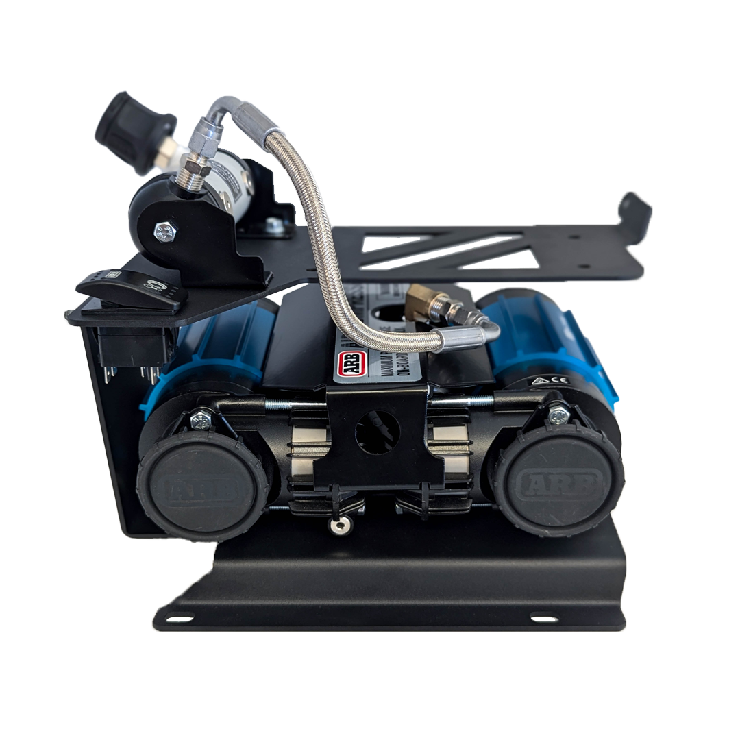 Front view of the twin compressor on its black mount with an air tank