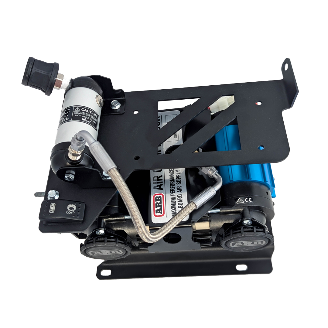 Twin blue air compressor with a white air tank on a black mounting plate