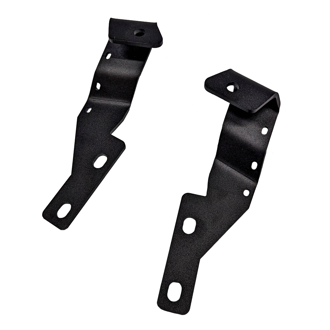 Pair of black ditch light brackets angled on a black background