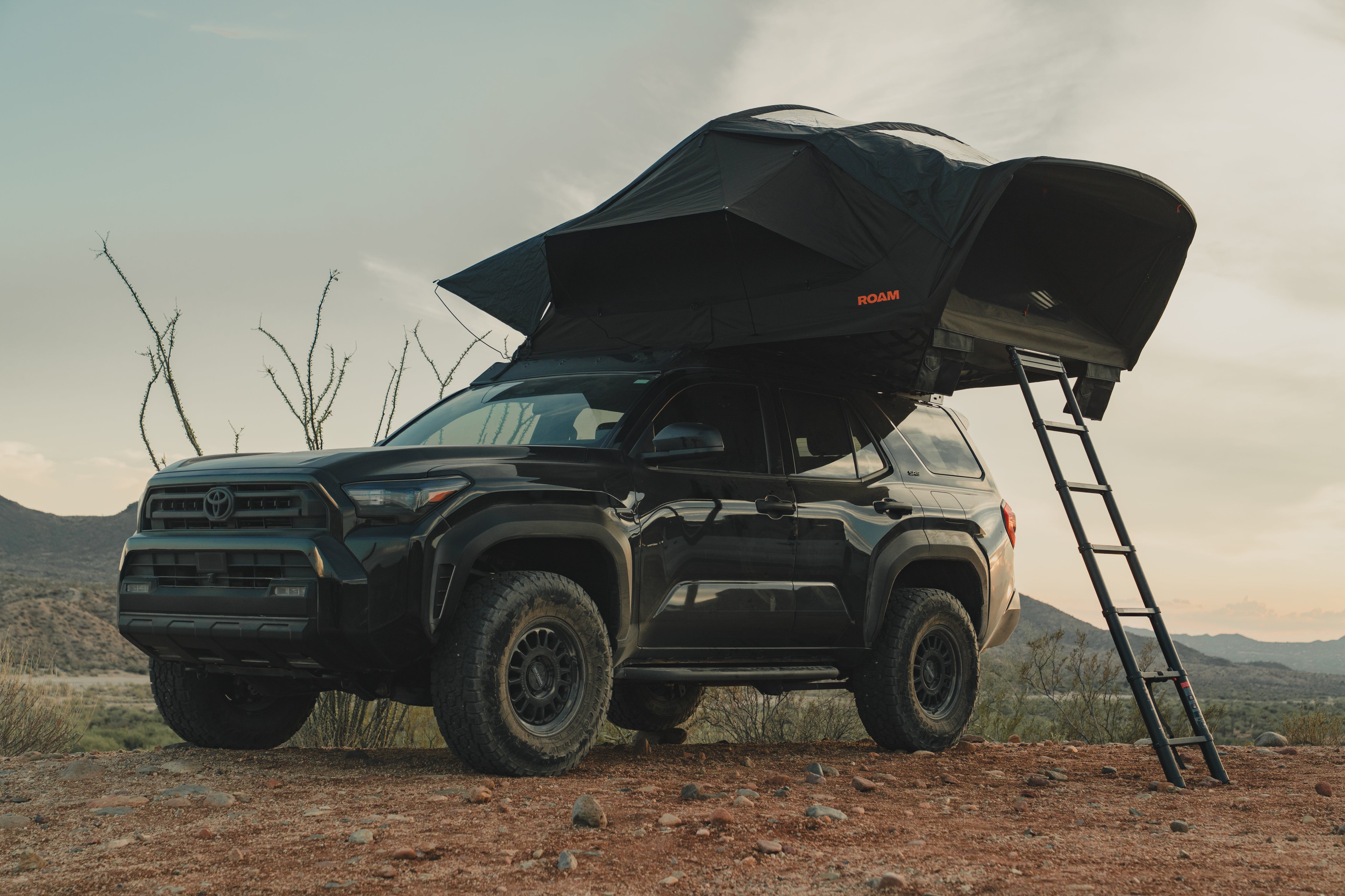 ROAM Vagabond 2.0 rooftop tent set up at camp