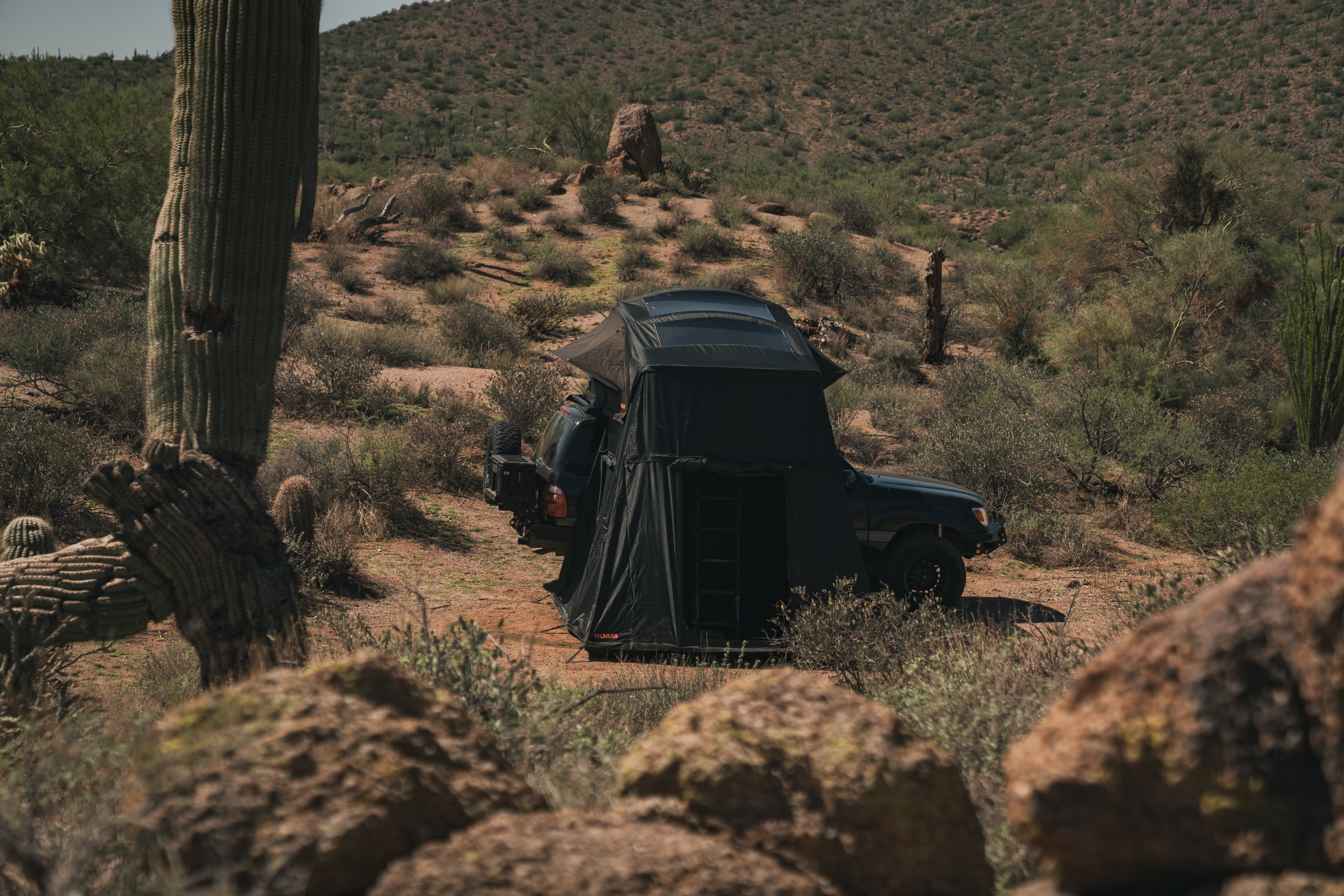 ROAM Vagabond 2.0 rooftop tent open at camp