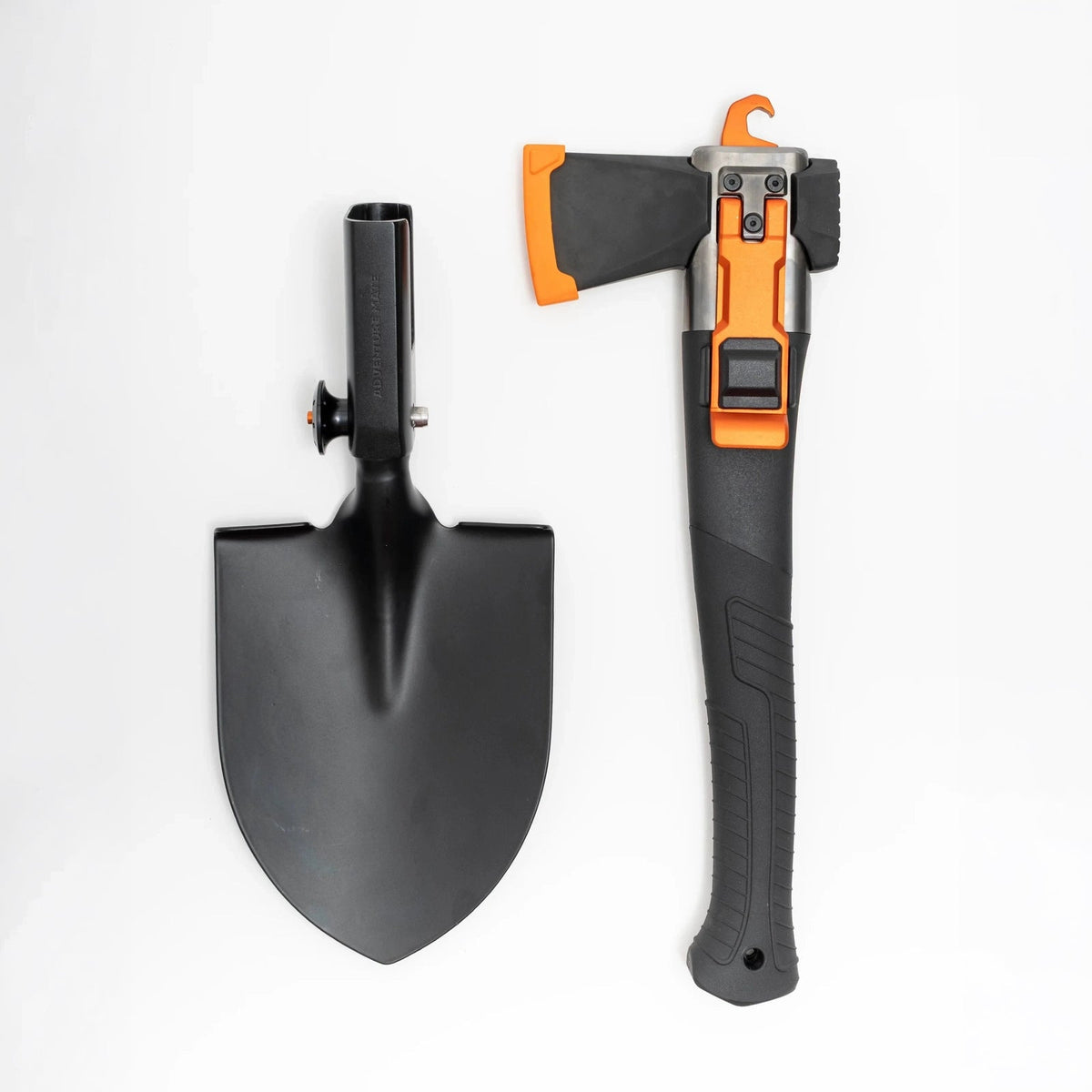 Adventure Mate shovel head beside the axe head and handle with orange lock lever, on white