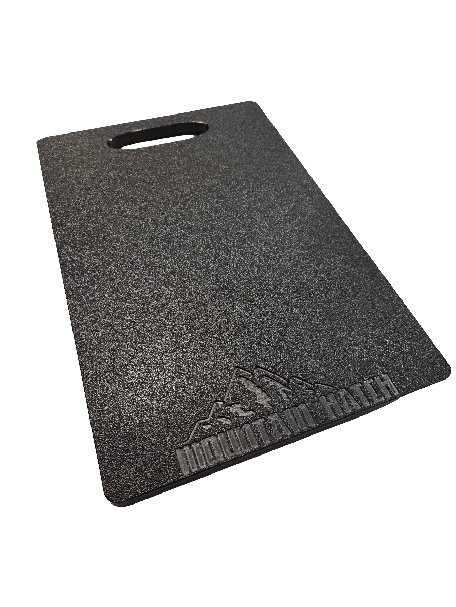 Mountain Hatch Bear Slapper 12 x 8 inch black HDPE cutting board with cut-out handle and stamped logo