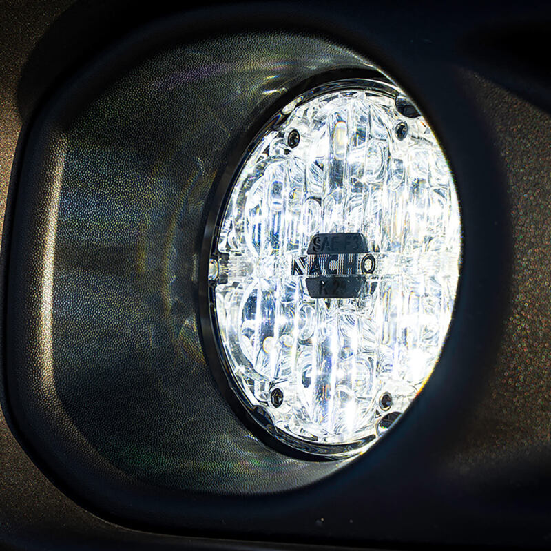 ARB Quatro SAE fog light close-up showing white lens and housing