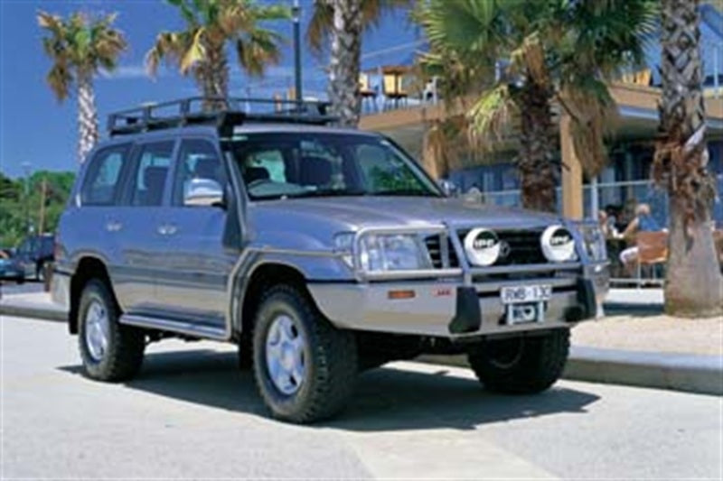 ARB Deluxe combination bumper on an IFS Toyota Land Cruiser 100 Series — front three-quarter view