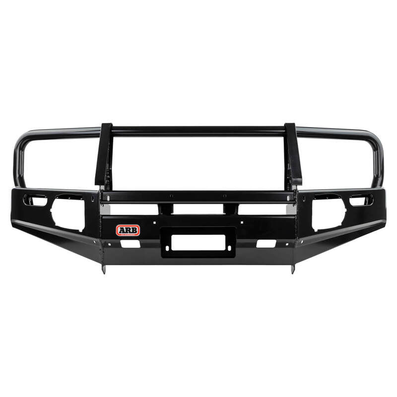 ARB Deluxe winch bumper on a Toyota Hilux with flares — front three-quarter view