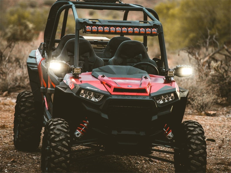 Polaris RZR Turbo A-pillar mount holding Rigid Reflect mirror and LED pods