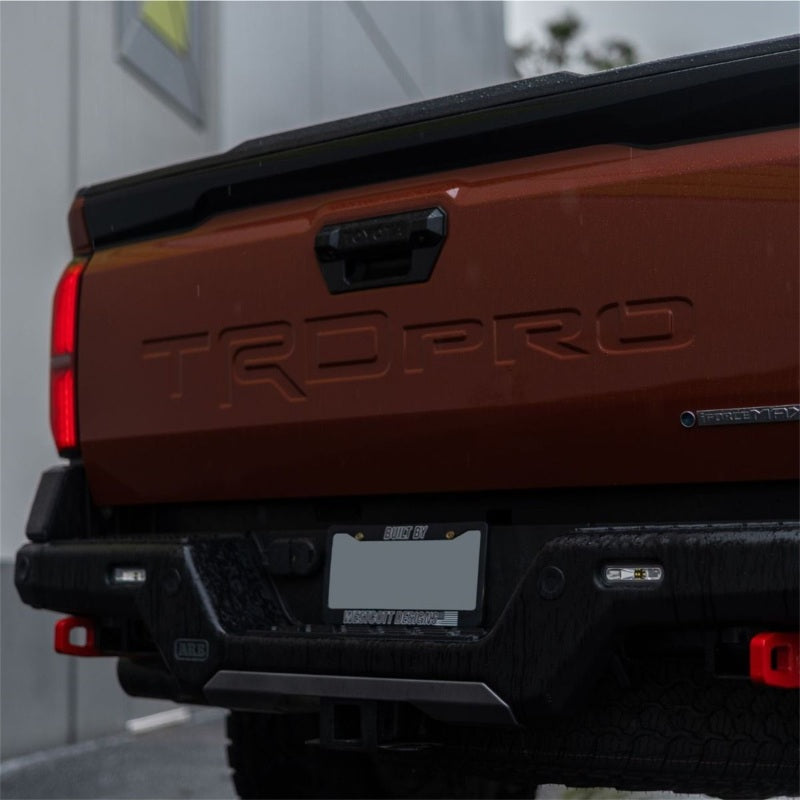 Rigid SR-L spreader light with red halo ring for the 2024+ Toyota Tacoma reverse kit