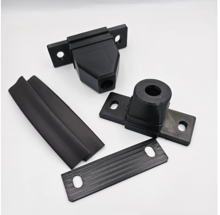 GG Offroad external camera housings shown at an angle with shim and heat shrink