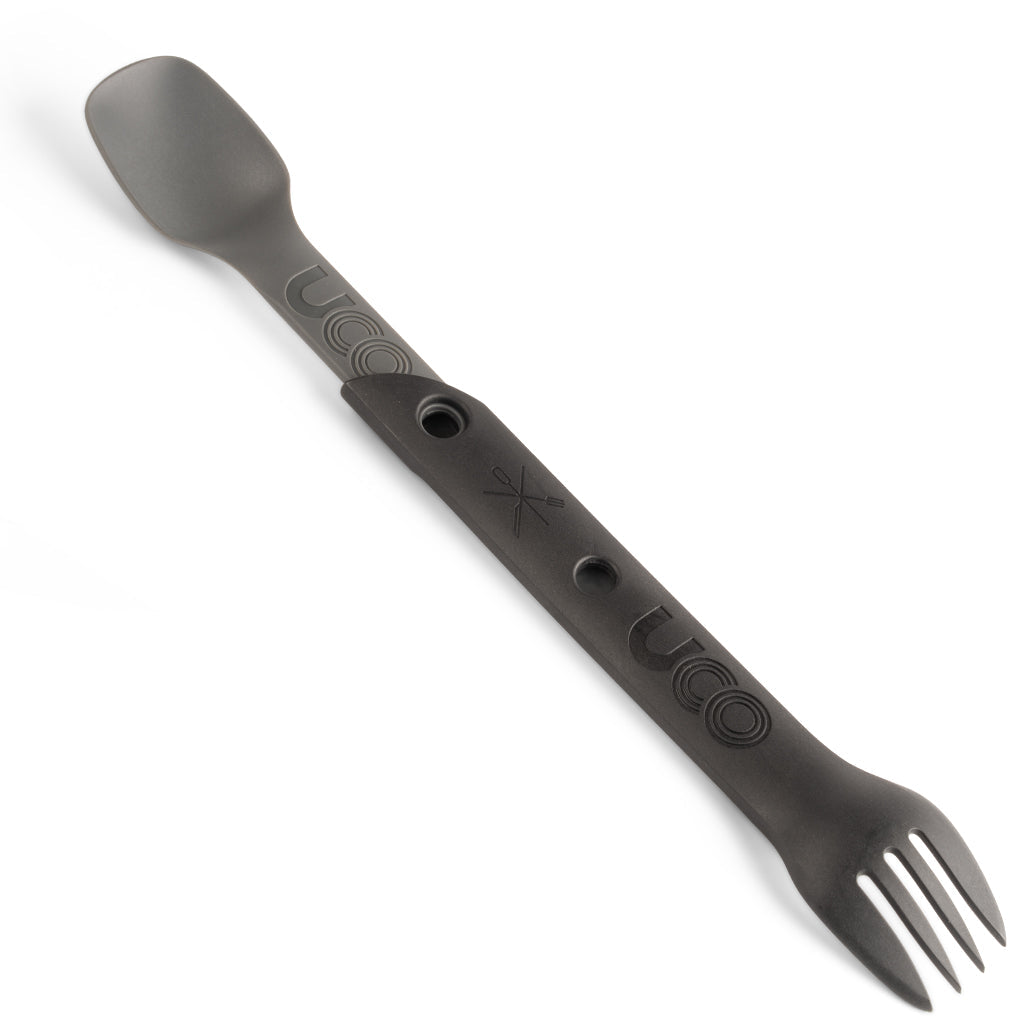 Charcoal gray UCO Switch Spork shown extended in long-handled mode