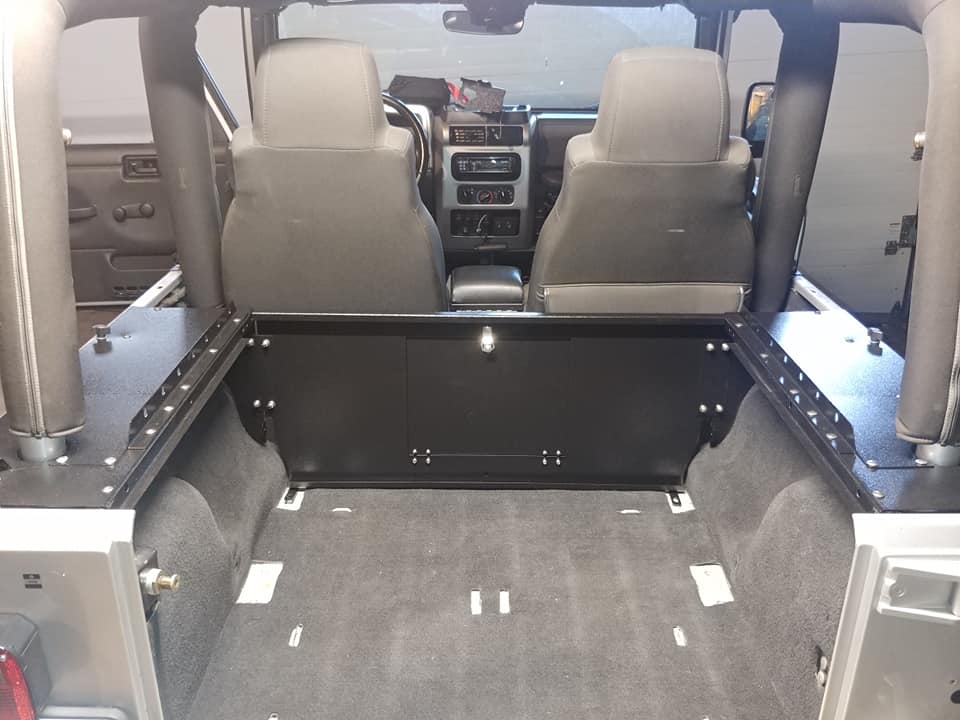 Slipstream forward wall and side mounts in a JK, looking toward the front seats