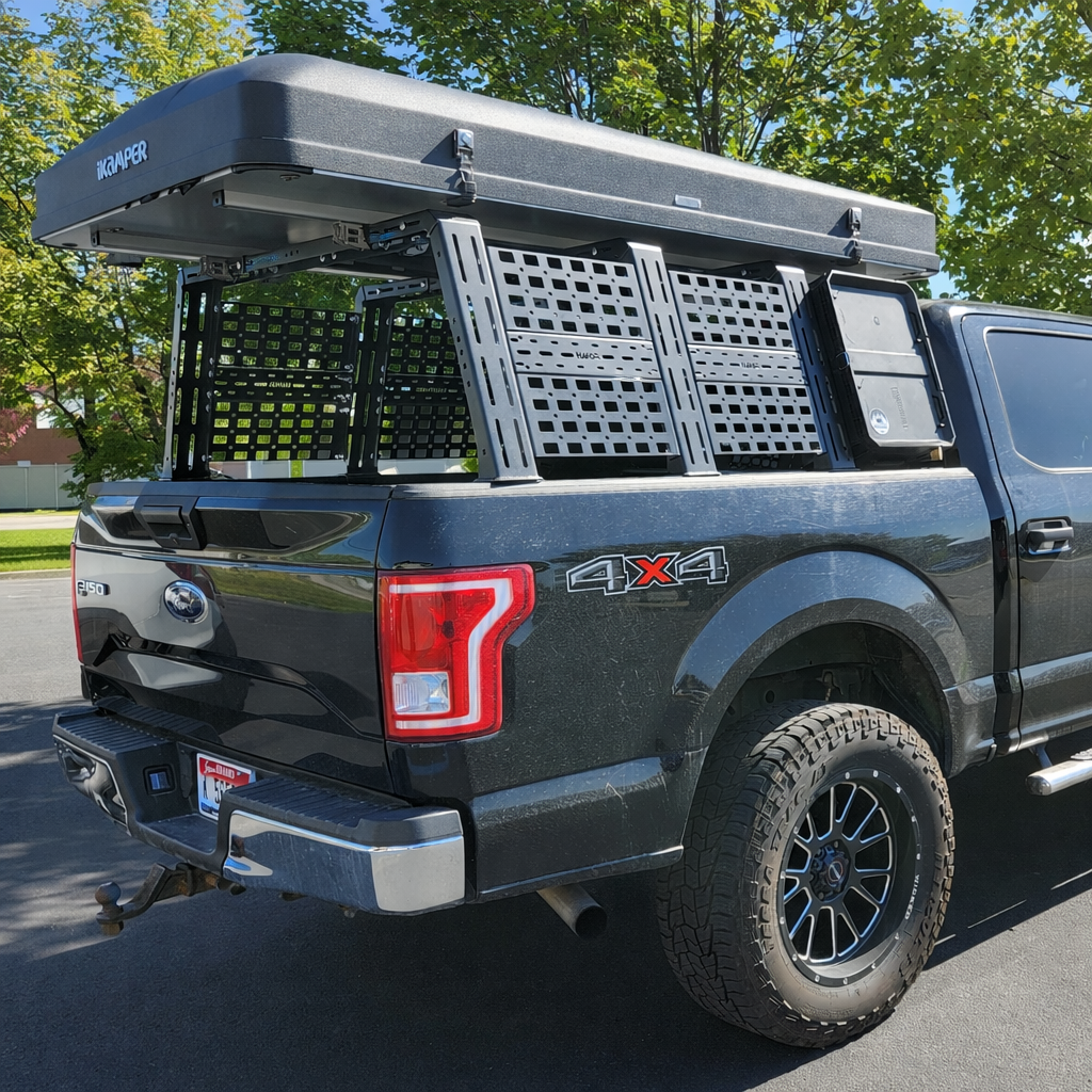 Ford F-150 with HMOR ROCK-IT rack and hard-shell tent, rear quarter view