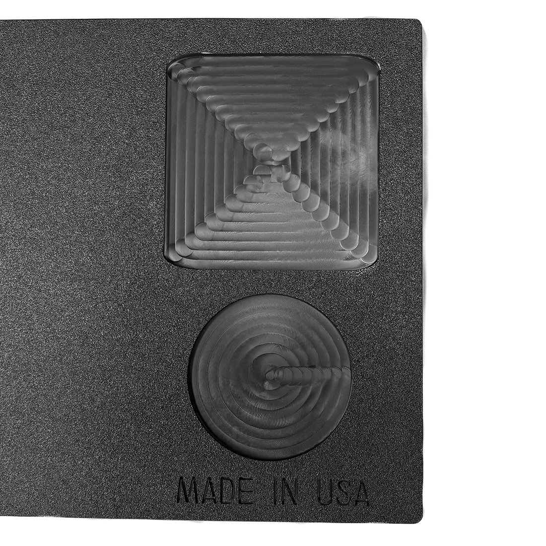 Close-up of the Grab n' Go recessed square tray and round drink holder with MADE IN USA stamp