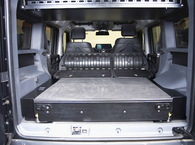 Grenadier drawer system below an Upper Deck shelf, rear doors open