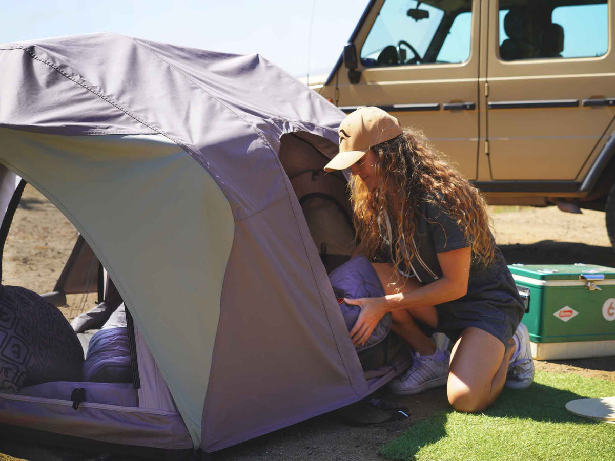 C6 Rev Rooftop Tent X (Element) – people relaxing at a camp with a ground tent