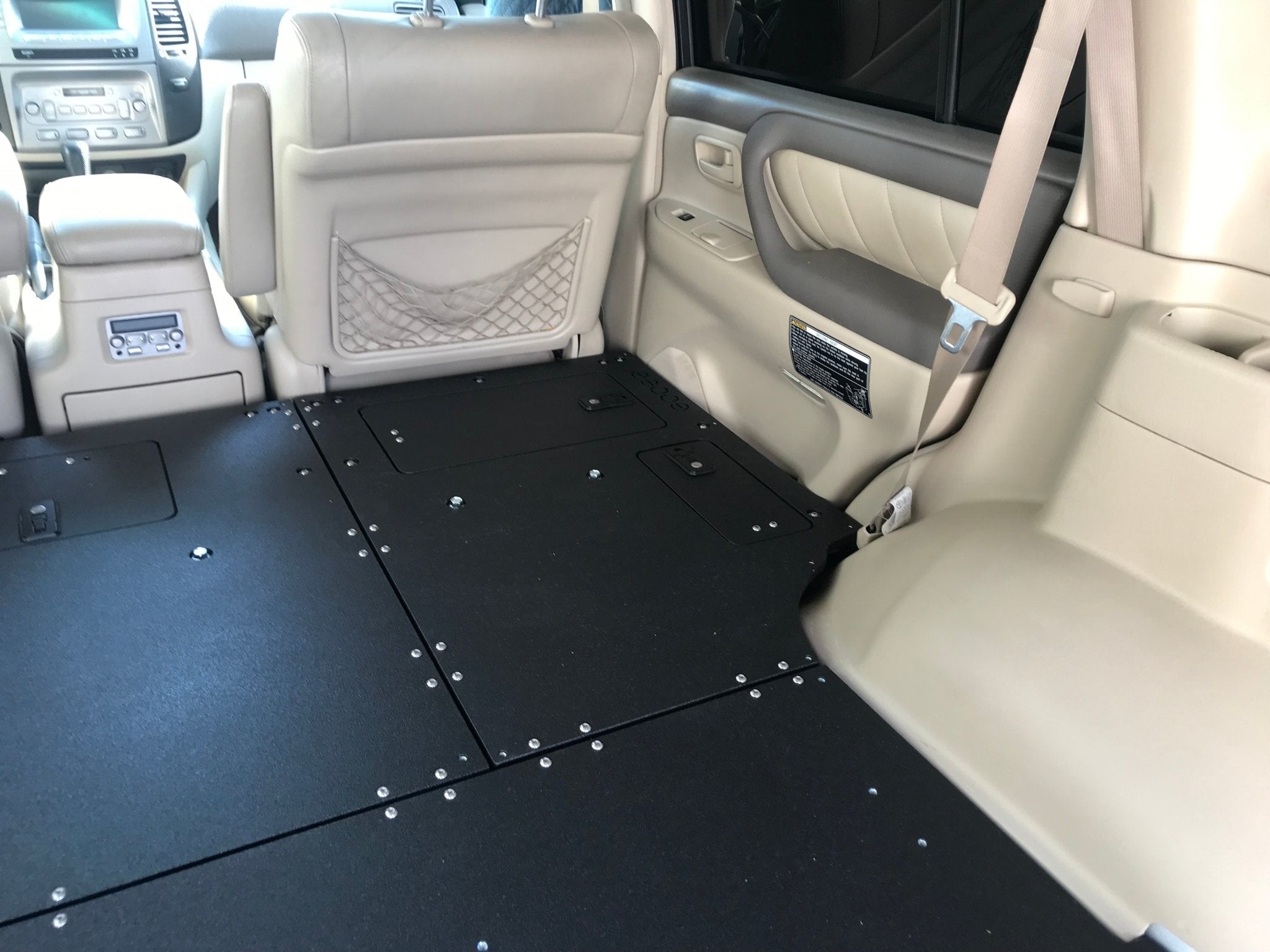 Toyota Land Cruiser 1998-2007 100 Series - Second Row Seat Delete Plate System Seat Delete Plate System Goose Gear- Overland Kitted