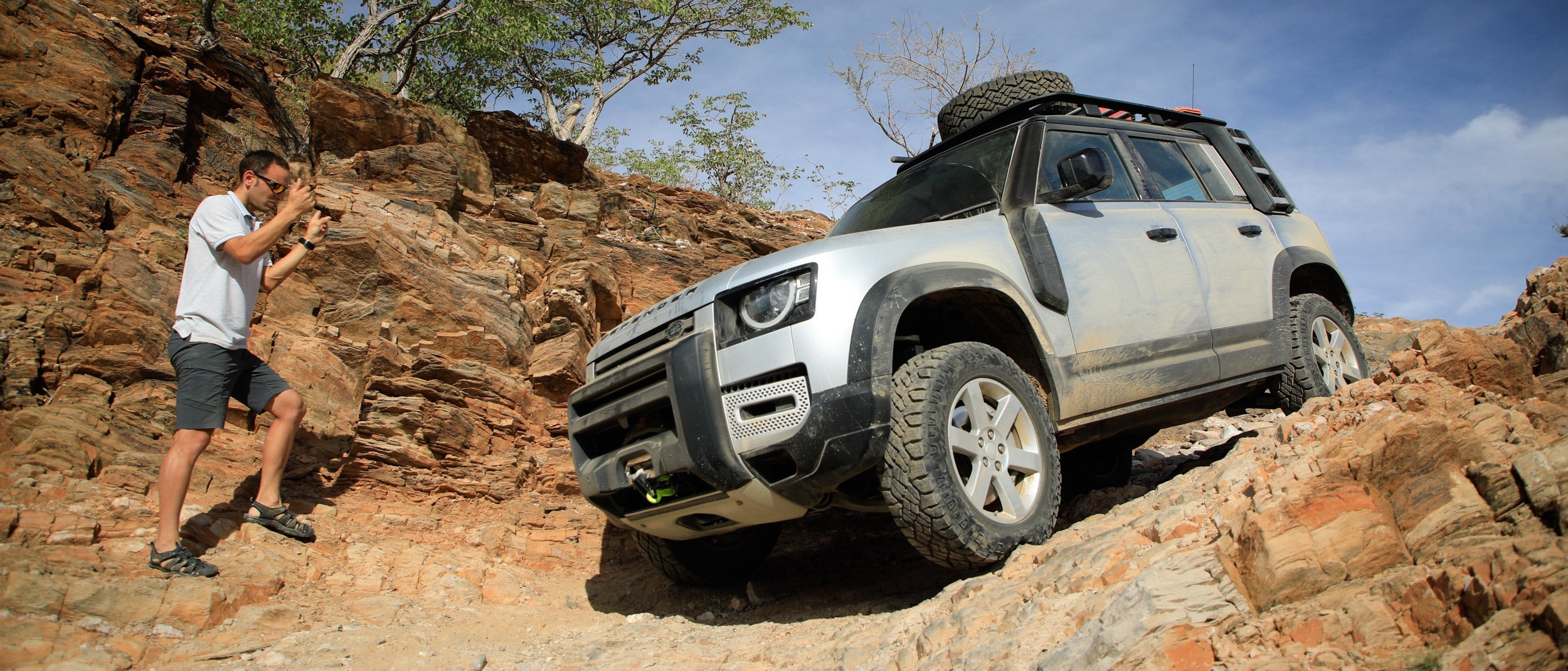 A land rover defender traverses van zyl's pass in northern namibia, taken by matthew scott