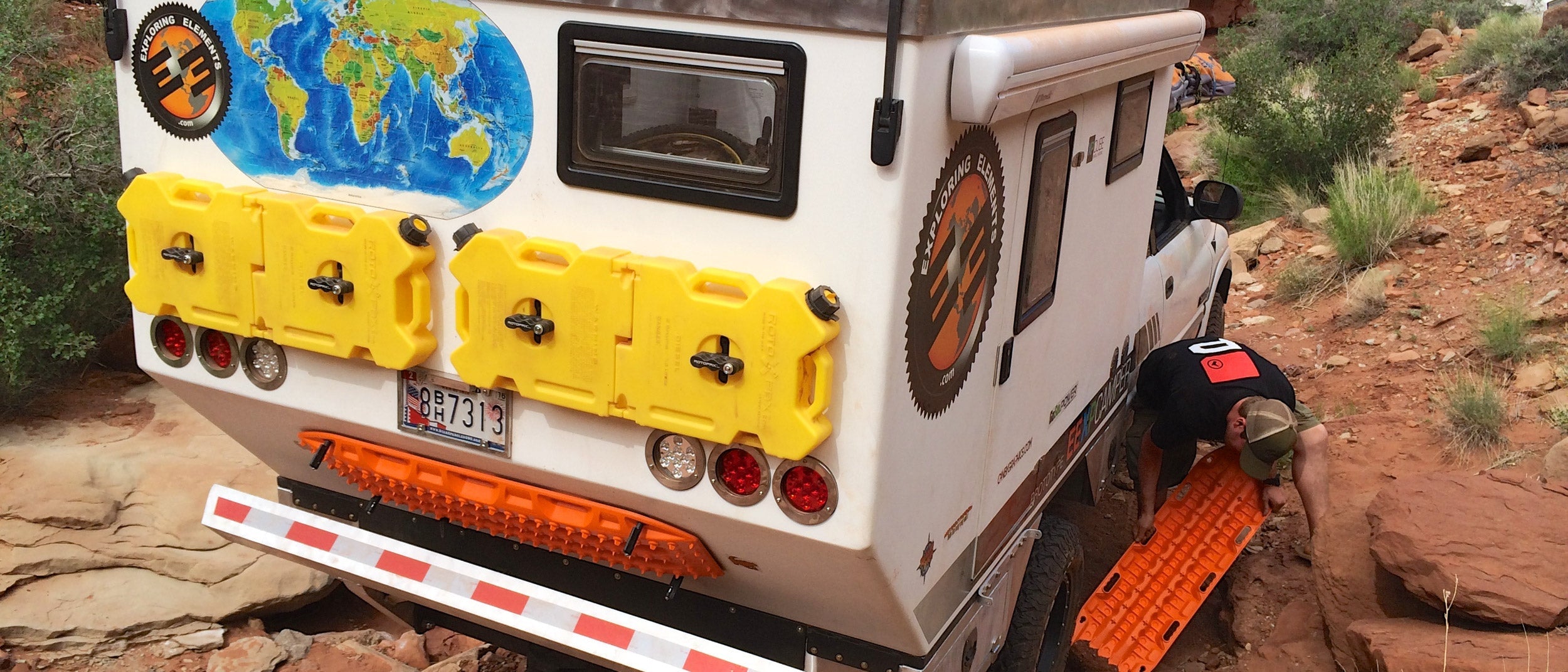 rotopax fuel canisters mounted on overland vehicle in utah