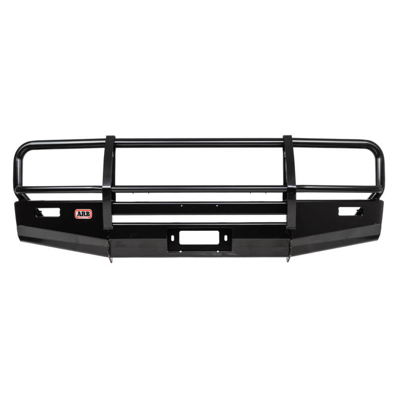 ARB Deluxe winch bumper on a live-axle Toyota Land Cruiser 105 Series — front three-quarter view