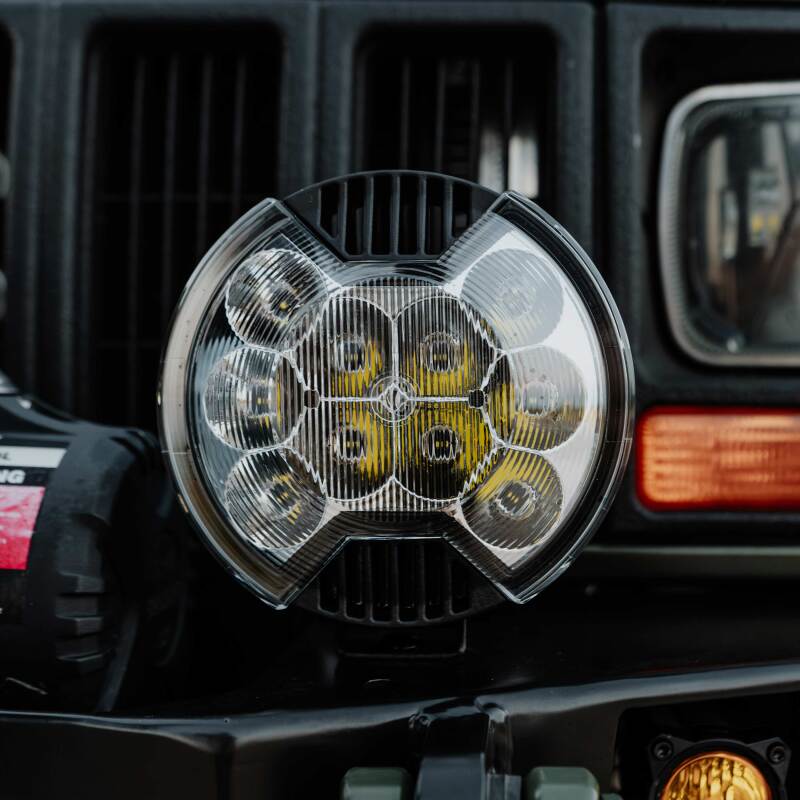 KC HiLiTES SlimLite 6in Light Shield - SAE Driving Beam - Clear, mounted view