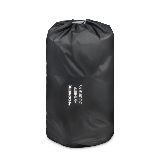 Dometic 10-inch High Self-Inflating Double Mattress, rolled and secured with straps in its stuff sack