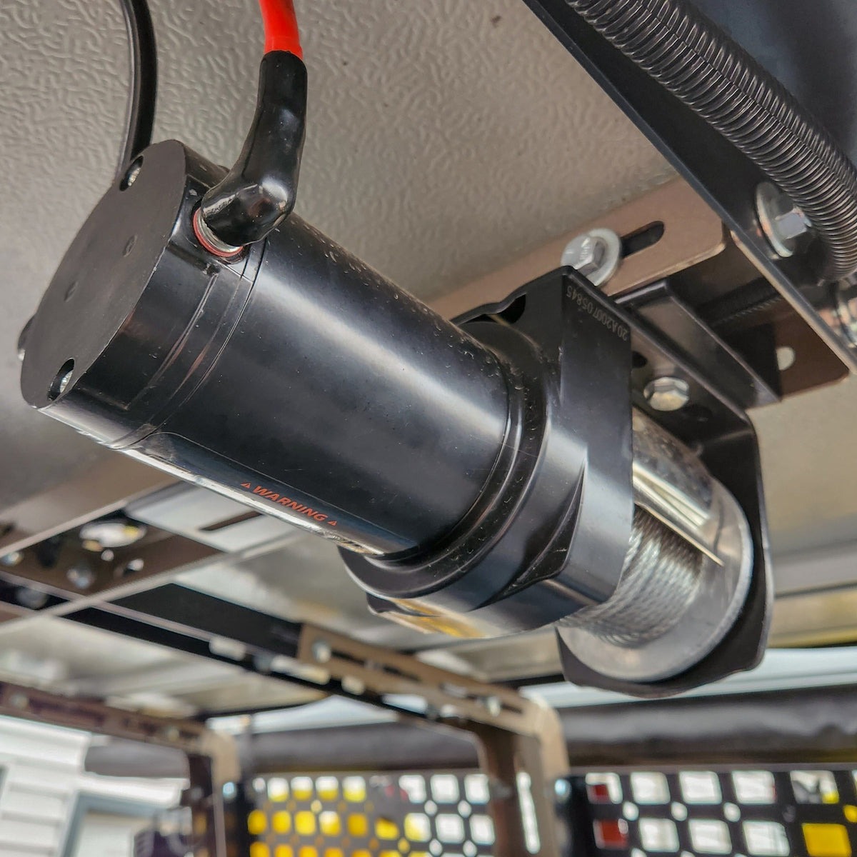 Close view of winch motor and mount bracket