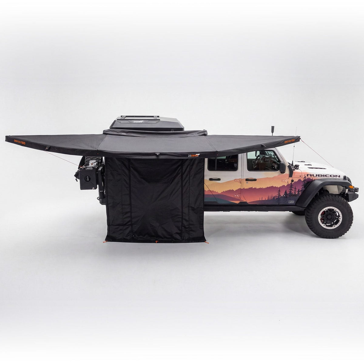 23ZERO Onyx 180 Wall Kit installed with one wall panel enclosed under the awning canopy on a Jeep Gladiator, side profile studio shot