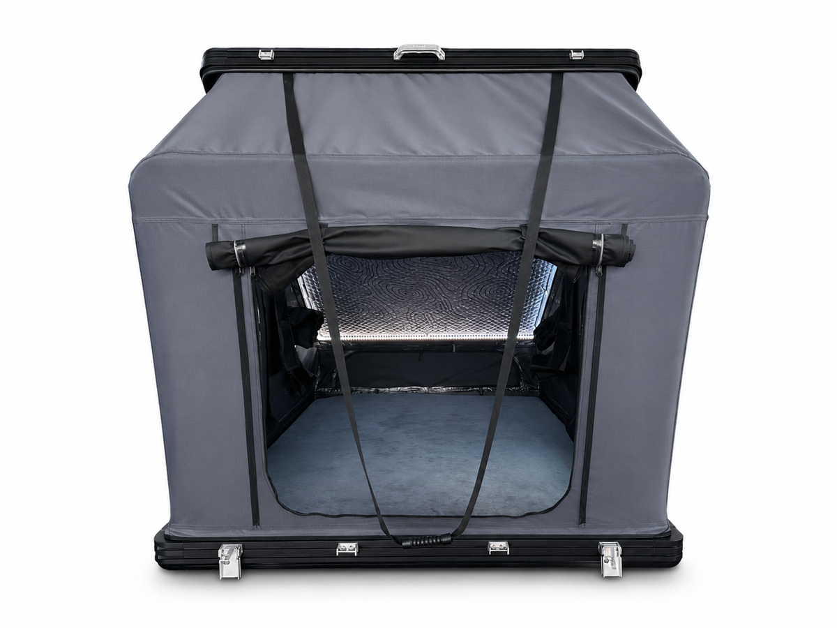 Taruca Dark Rogue rooftop tent open, front view of the entry and mattress
