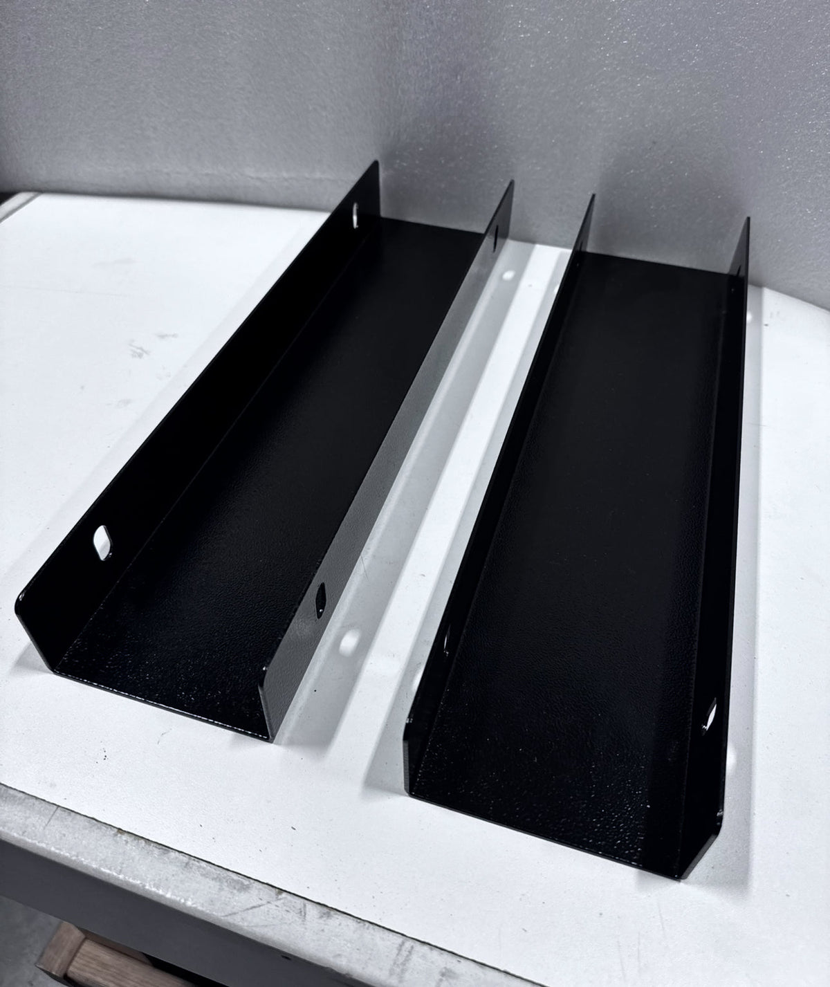 Mid Deck risers on a bench showing the channel profile