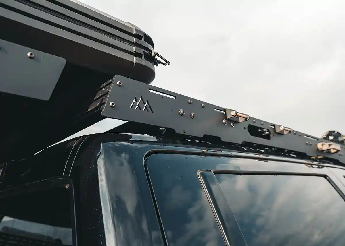 DRIFTR Toyota Tundra roof rack, rear view showing the full-length rear fairing extrusion