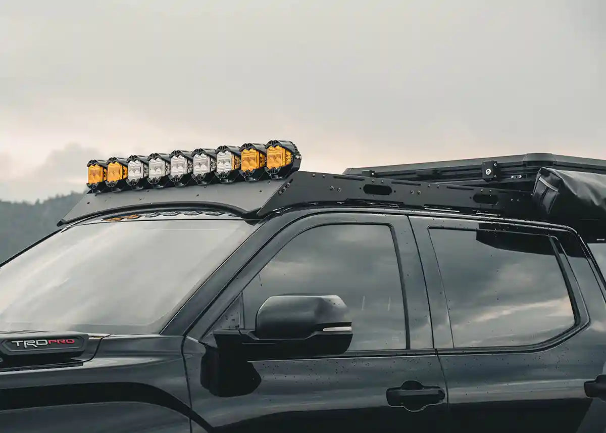 DRIFTR roof rack installed on a 3rd Gen Toyota Tundra, low angle roofline shot at dusk